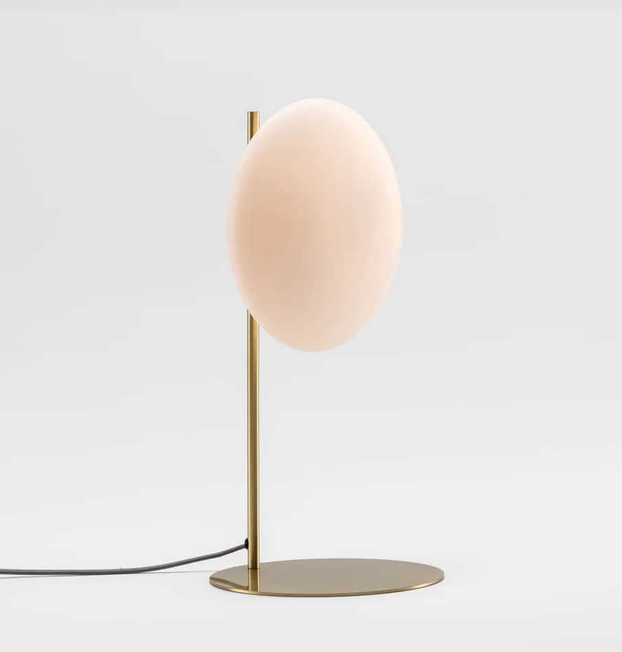 Table lamp with oversize oval shade
